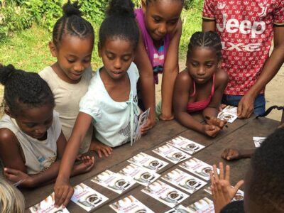Kids in the village outside Masoala National Park enjoy playing LCN's card game.